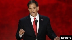 U.S. Senator Marco Rubio (R-FL) addresses delegates as he introduces Republican presidential nominee Mitt Romney during the final session of the Republican National Convention in Tampa, Florida, August 30, 2012 REUTERS/Mike Segar (UNITED STATES - Tags: P