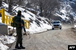 An Israeli soldier stands guard at the Hermon ski resort, bordering Syria and Lebanon, in the Israeli-occupied Golan Heights on Jan. 8, 2025.