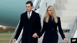 FILE - Ivanka Trump, right, departs Air Force One with Jared Kushner.