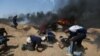 Palestinians Culminate Weeks of Protests on Gaza Border