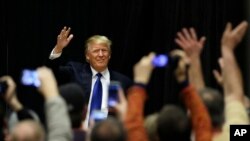Donald Trump lors d'un meeting en Iowa, le 30 janvier 2016. (AP Photo/Charlie Neibergall)