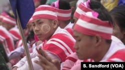 Ethnic Karen dancers watch the ceremonies at the Karen Revolution day ceremonies Jan. 31, 2019, in Karen state, Myanmar, near the Thai-Myanmar border.