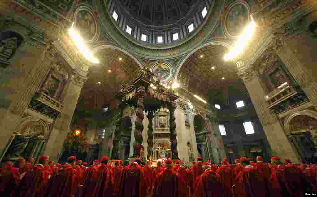Cardinals attend a Mass in St. Peter's Basilica at the Vatican, March 12, 2013.