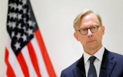 FILE - Brian Hook, U.S. Special Representative for Iran, attends a news conference in London, June 28, 2019.