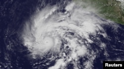 Hurricane Sandra is seen in a NOAA image taken from the GOES East satellite off the coast of Mexico, Nov. 25, 2015.
