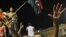 Rakyat Libya merayakan kemenangan setelah berhasil merebut kediaman Gaddafi di Tripoli (24/8).