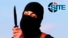 FILE - A masked, black-clad militant, who has been identified by the Washington Post newspaper as a Briton named Mohammed Emwazi, brandishes a knife in this still image from a 2014 video obtained from SITE Intel Group February 26, 2015. 