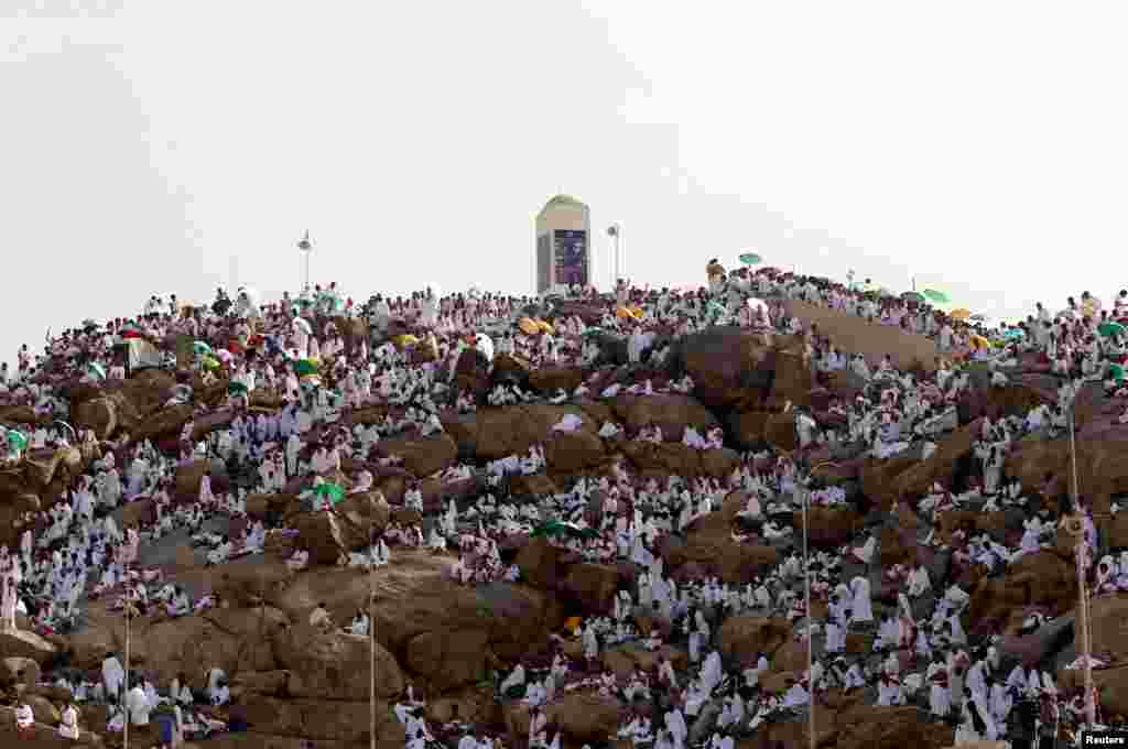 Muslim pilgrims gather on Mount Mercy on the plains of Arafat during the annual haj pilgrimage, outside the holy city of Mecca, Saudi Arabia.