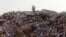 FILE - Muslim pilgrims gather on Mount Mercy on the plains of Arafat during the annual haj pilgrimage, outside the holy city of Mecca, Saudi Arabia, Sept. 11, 2016. 