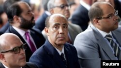 FILE - Supreme Court Judge Angel Zerpa Aponte, facing camera, attends a National Assembly swearing-in ceremony for a parallel Supreme Court in Caracas, Venezuela, July 21, 2017.