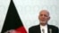Afghan President Ashraf Ghani, listens during a press conference with NATO Secretary General Jens Stoltenberg, at the presidential palace, in Kabul, Afghanistan, Nov. 6, 2018.