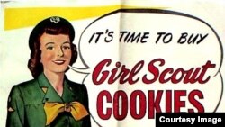 A vintage banner advertises Girl Scout cookies. (Courtesy / Girl Scouts of the United States of America)