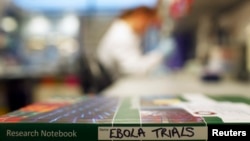 File - An Ebola trials notebook is seen in a laboratory during trials for an Ebola vaccine at The Jenner Institute in Oxford, southern England January 2015.