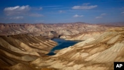 FILE - A part of Band-e-Amir is seen in this photo in Bamiyan province of Afghanistan, Nov. 8, 2016. The cascading collection of deep-blue high-mountain lakes became Afghanistan's first provisional national park in 2009.