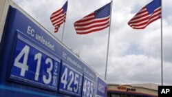 Prices at a US gasoline station (file)