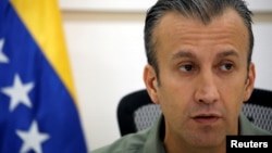 FILE - Venezuela's Vice President Tareck El Aissami talks to the media during a news conference in Caracas, Venezuela, Nov. 17, 2017. 