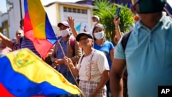 Simpatizantes del dirigente opositor Freddy Superlano participan en una manifestación en Barinas, Venezuela, el 4 de diciembre de 2021.