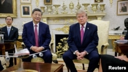 US President Donald Trump and China's President Xi Jinping meet at the White House in Washington, D.C.