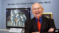 FILE - Alan Bean, the fourth man to walk on the moon, is shown during a preview of his work at the Lyndon Baines Johnson Library and Museum in Austin, Texas, Oct. 1, 2008. Bean, the Apollo and Skylab astronaut, the fourth human to walk on the moon and an