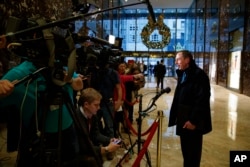 Former CIA director and retired Gen. David Petraeus talks with reporters after a meeting with President-elect Donald Trump, Monday, Nov. 28, 2016, in New York. Petraeus is being considered for cabinet position of secretary of state.