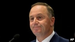 New Zealand Prime Minister John Key announces his decision to resign and stand-down from politics at a press conference in Wellington, New Zealand, Dec. 5, 2016.