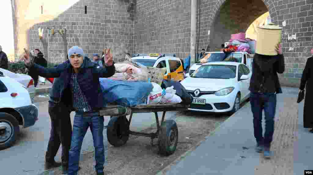 Residents living Sur district in Diyarbakir after the curfew was expanded