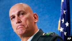 FILE - In this Oct. 2, 2007, photo, Lt. Gen. Raymond T. Odierno, who serves as the commanding general of Multi-National Corps-Iraq, gives an update on conditions.