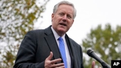 FILE - White House then-chief of staff Mark Meadows speaks with reporters outside the White House, in Washington, Oct. 26, 2020.