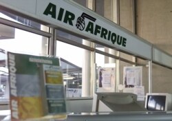 FILE - An empty counter of Air Afrique is pictured at Roissy airport in Paris, June 13, 2001.
