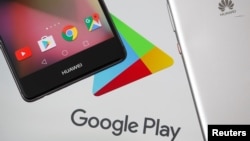 Huawei smartphones are seen in front of displayed Google Play logo in this illustration picture, May 20, 2019.