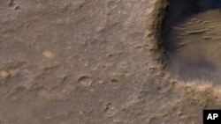 Bright dot near lower-left corner of image is three-petal lander platform from 2004 mission, Feb. 9, 2012.