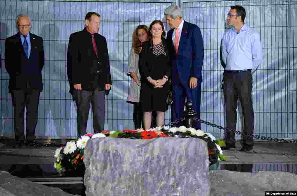 U.S. Secretary of State John Kerry hugs Yitzhak Rabin's daughter Dalia after laying a wreath at the site where the former Israeli Prime Minister was assassinated in 1995, during a stop in Tel Aviv, Israel, on November 5, 2013.