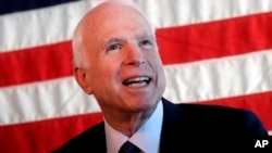 FILE - U.S. Sen. John McCain, R-Ariz., smiles after touring the Wren House Brewery, Nov. 1, 2016, in Phoenix.