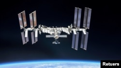 In this file photo, the International Space Station (ISS) is photographed by Expedition 56 crew members from a Soyuz spacecraft after undocking, October 4, 2018. (NASA/Roscosmos/Handout via REUTERS)