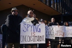 FILE - Kameelah Rashad participates in a rally for Muslim rights outside of the James A. Byrne Federal Courthouse in Philadelphia, Jan. 13, 2015. The rally followed a U.S. Court of Appeals hearing seeking to overturn the dismissal of Hassan v. City of New York, a case that challenges the NYPD's blanket surveillance of Muslims in New Jersey.