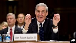 Then FBI Director Robert Mueller testifies on Capitol Hill in Washington, June 19, 2013, before the Senate Judiciary Committee.