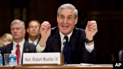 Then FBI Director Robert Mueller testifies on Capitol Hill in Washington, June 19, 2013, before the Senate Judiciary Committee.