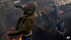 Palestinians Protest During West Bank Funerals