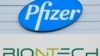 FILE - Combination of file photographs with the logo of Pfizer at the production site of the COVID-19 vaccine in Puurs, Belgium, and a logo of BioNTech at the headquarters of the company in Mainz, western Germany.