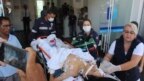 Học sinh bị thương trong vụ nổ súng tại trường công lập Raul Brasil, bang Sao Paulo được chở vào bệnh viện ở Suzano, Brazil, ngày 13/3/2019. 