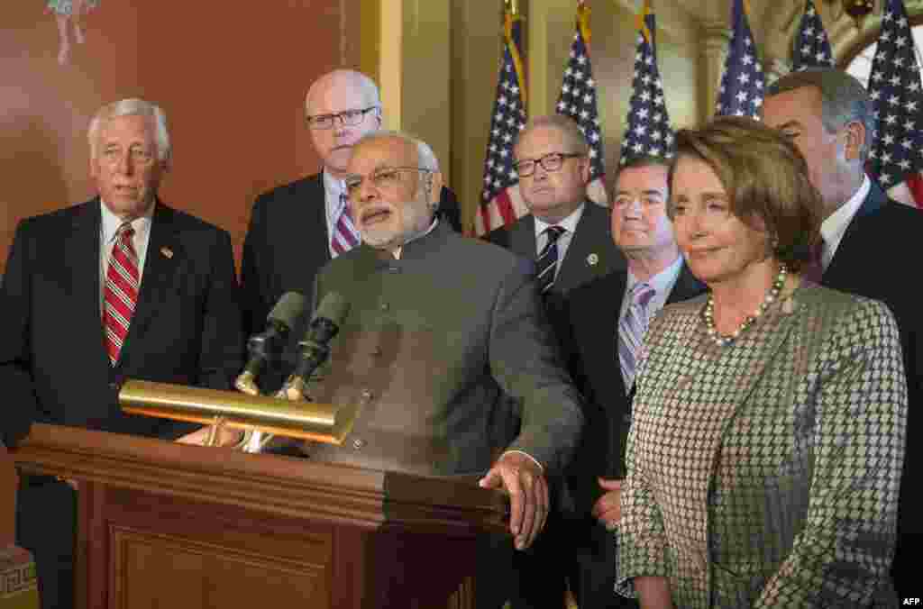 India's Prime Minister Narendra Modi (C) speaks after a meeting with congressional leadership on Capitol Hill in Washington, D.C., Sept. 30, 2014.