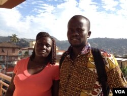 Ebola survivors Massah Stevens and Yusif Koroma stand outside the Sierra Leone association of Ebola survivors, in Freetown, Sierra Leone, Jan. 6, 2016. (Nina Devries /VOA)