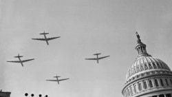 Air Force planes fly over the Capitol building on January 20, 1949, during the inaugural parade for President Harry Truman