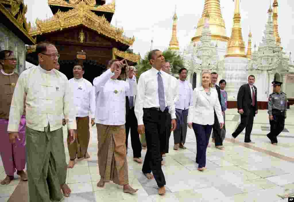U.S. President Barack Obama tours the Shwedagon Pagoda with Secretary of State Hillary Rodham Clinton in Rangoon, Burma, Monday, Nov. 19, 2012. 
