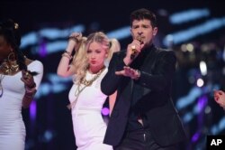 Robin Thicke performs at IHeartRadio Music Festival, day 1, Sept, 20, 2013 in Las Vegas.