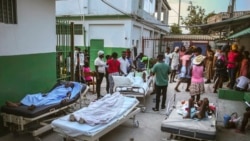 People injured during the earthquake are treated in the hospital in Les Cayes, Haiti, Sunday, Aug. 15, 2021.