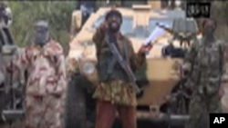 FILE - Abubakar Shekau speaks in a video sent to AP on May 5, 2014.