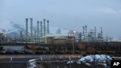 FILE - Iran's heavy water nuclear facility is backdropped by mountains near the central city of Arak, Jan. 15, 2011. 