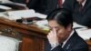 Japan Downgrades Economic Forecast