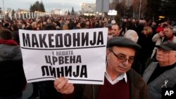 People gather on a protest march, in Skopje, Macedonia, Feb. 27, 2017.